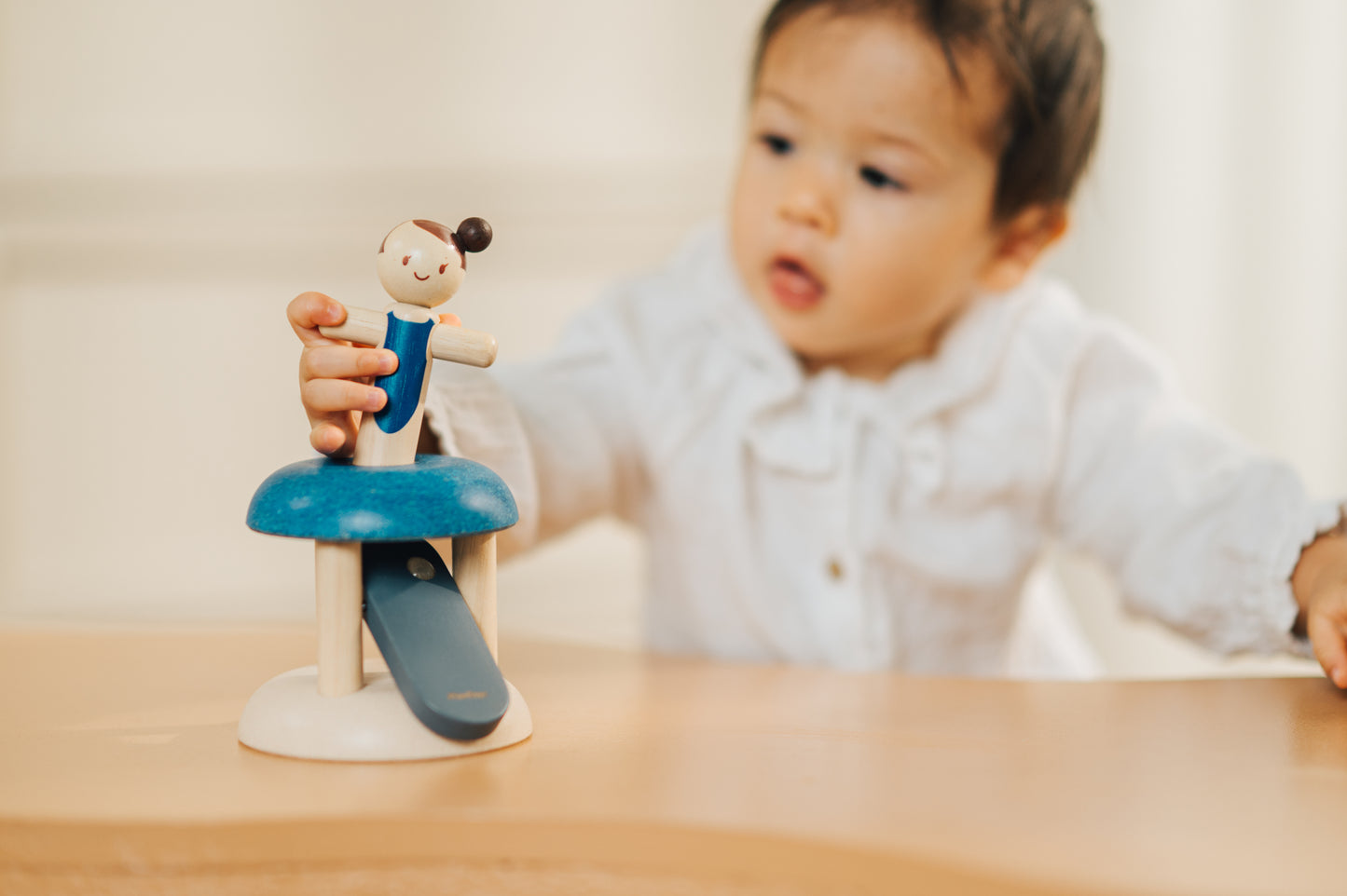 PlanToys Jumping Gymnast — Wooden Press Toy for Babies